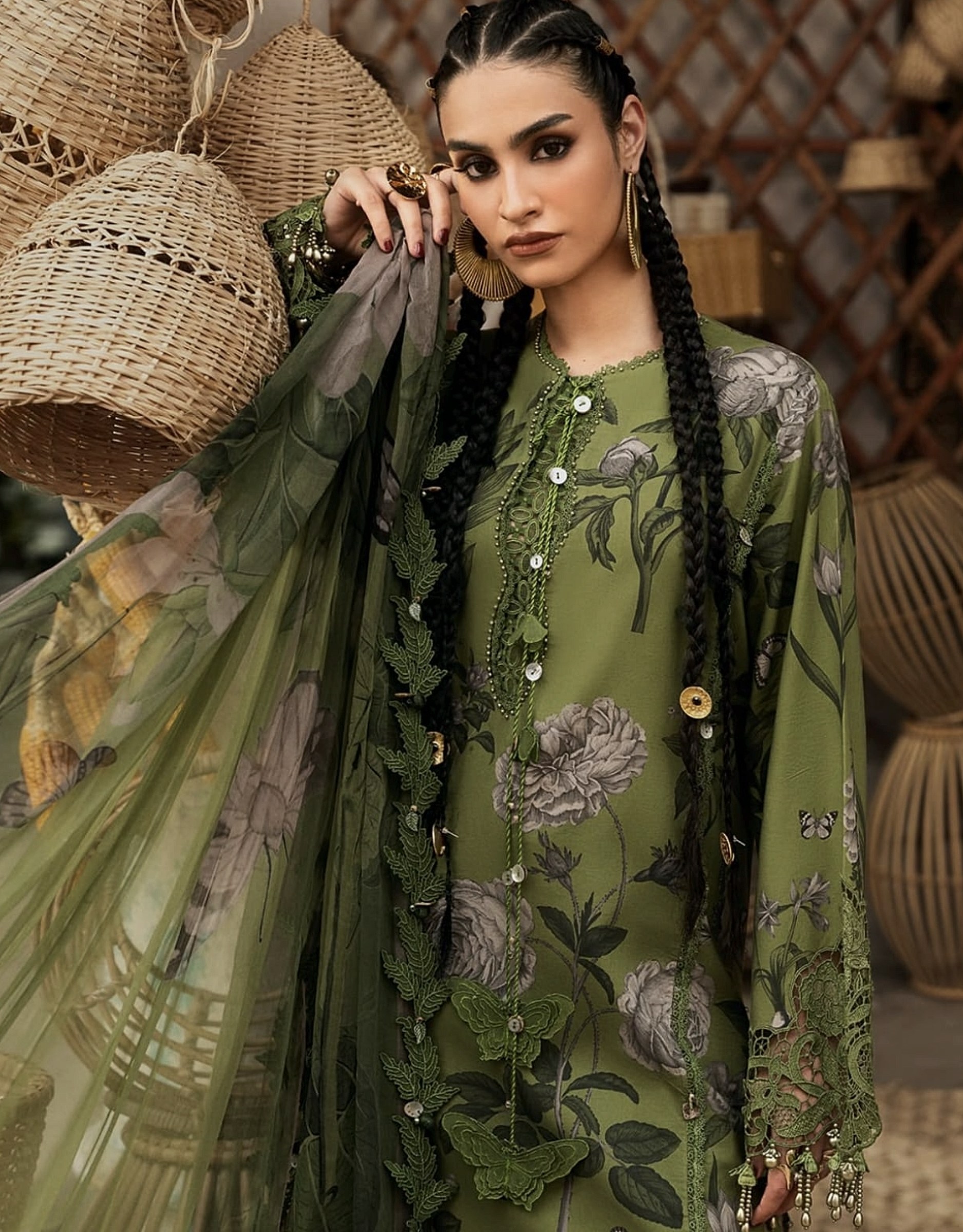 Green botanical-print suit with lace cuffs and a sheer printed dupatta