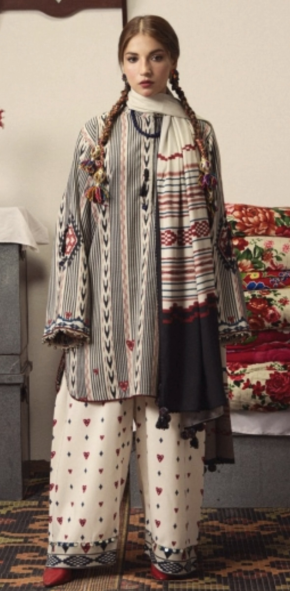 Ivory ikat-striped kurti worn with heart-print palazzos