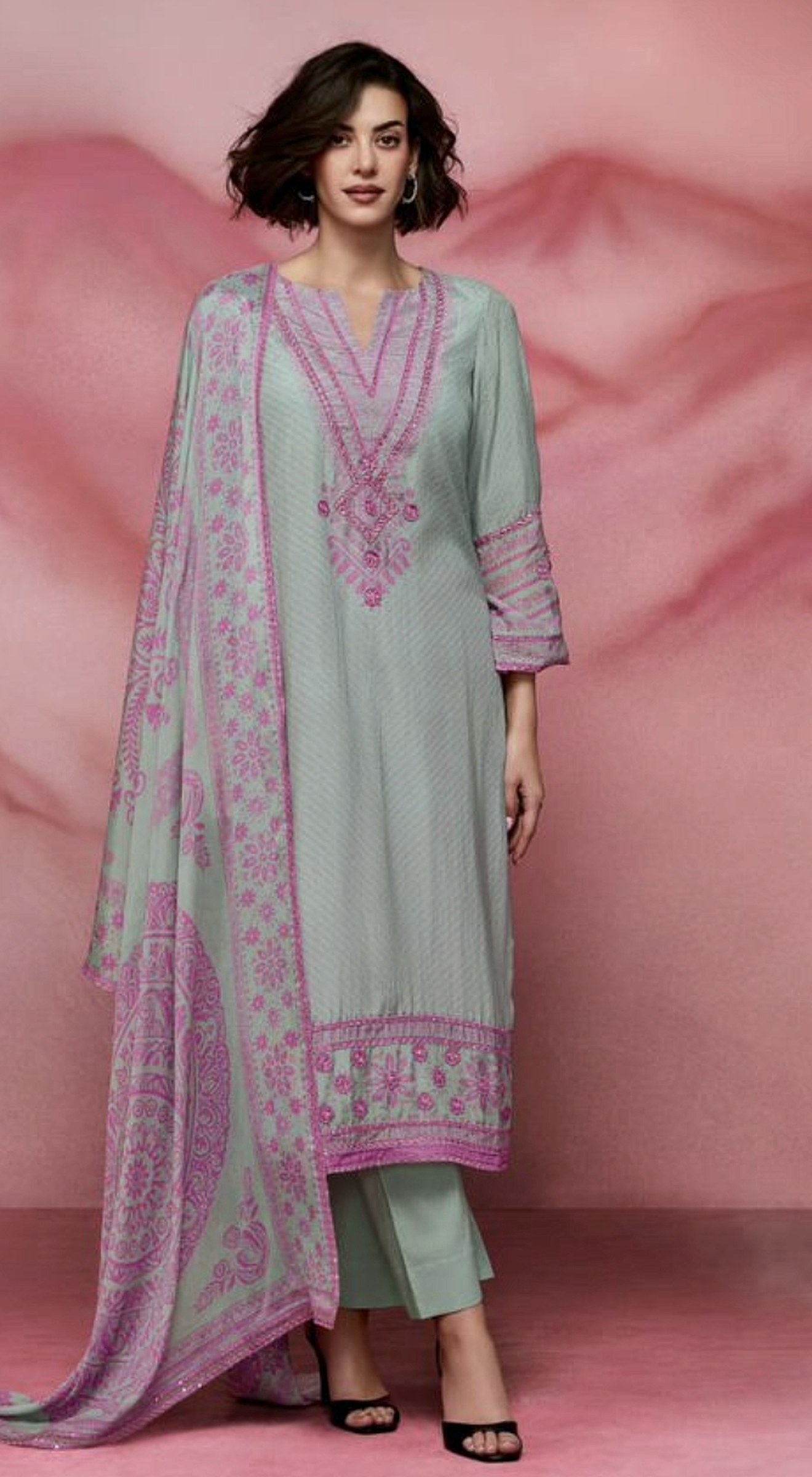 Sage suit set with orchid-pink embroidery and a printed dupatta